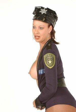 Playful MILF Vanessa Videl wears her slutty police uniform and shows off her on ladyda.com