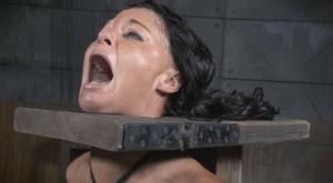 Restrained brunette London River is forced to suck a black penis on ladyda.com