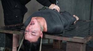 London River is mummified and tied down before being throat fucked in dungeon on ladyda.com