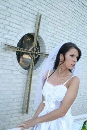 MILF babe in bride's dress Jennifer Dark spreading pussy on ladyda.com