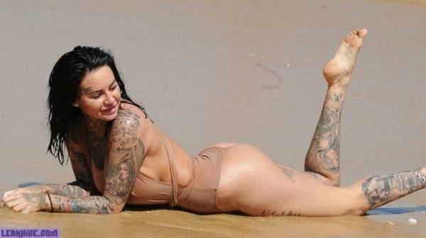 Jemma Lucy showing her ass and cleavage on the beach on ladyda.com