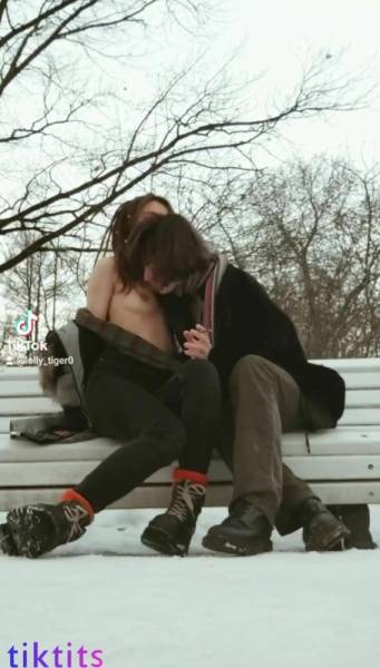 Two underage 18+ TikTok girls have fun in a snowy park and suck each other's virgin nipples nsfw on ladyda.com