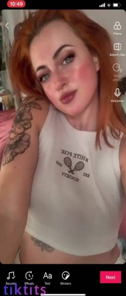Redheaded bitch with pretty freckles showed her size 34H TikTok tits on ladyda.com