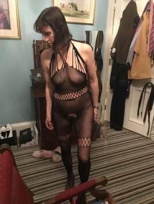 Older amateur Slut Scot Susan shows her beaver on a bed in a bodystocking - Scotland on ladyda.com