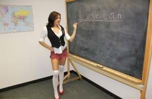 Naughty schoolgirl Cherry Poppins seduces a fellow student in slut wear on ladyda.com