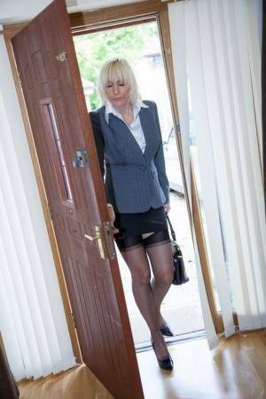 Older MILF Jan Burton strips off business clothes after a hard day at office on ladyda.com