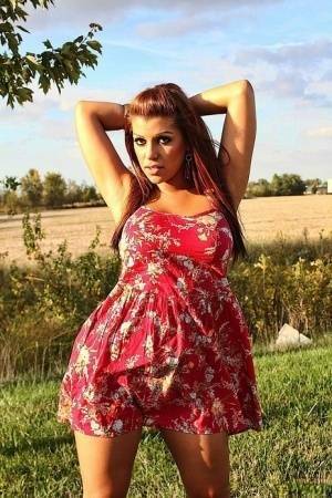 Amateur solo girl Briana Lee flashes her tits and twat in the countryside on ladyda.com