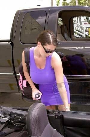 Linsey Dawn McKenzie shows her upskirt area in the car. on ladyda.com