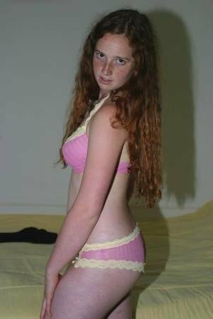 Flexible redhead Rachel showcases her natural pussy after lingerie removal on ladyda.com