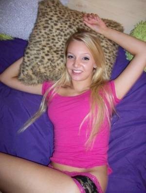 Cute teen girl with blonde hair shows off her tits and twat for the first time on ladyda.com