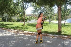 Latina solo girl Carolina Abril shedding shorts to expose nice ass outdoors on ladyda.com