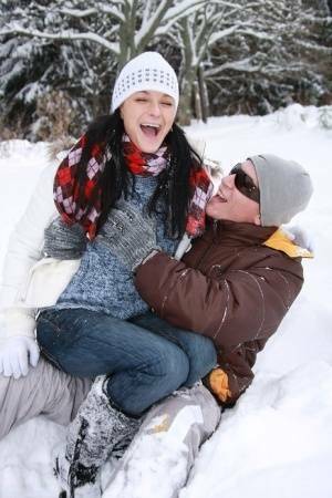 Teen girl opens her mouth for a cumshot after fucking in the snow on ladyda.com