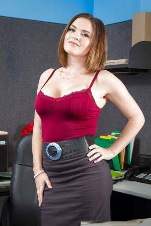 Secretary Krissy Lynn shows her fuckable booty in the office on ladyda.com