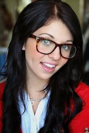 Glasses on round face of cute girl Madelyn Monroe stress her tiny tits on ladyda.com