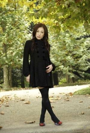 Fully clothed Japanese teen models in the park in black clothes and stockings - Japan on ladyda.com