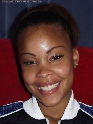 Black amateur Candice flashes a nice smile before baring her great body on ladyda.com