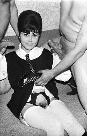 Small titted vintage schoolgirl removes her uniform for a big cock threesome on ladyda.com