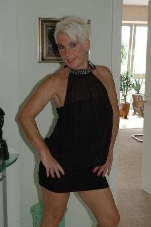 Blonde mature Claudia stipping out of a black dressAmateur,Mature,Stripping on ladyda.com