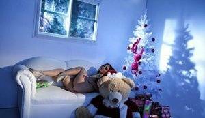 Hot girl Natasha Nice masturbates with a vibrator while alone at Christmas on ladyda.com